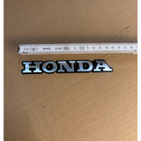 Honda plate with two holes for screws - new without packaging