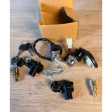 Différentes pièces du kit de contact Dax