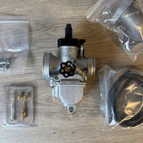 CPO PE19 carburetor—new kit, but the intake manifold rubber is missing