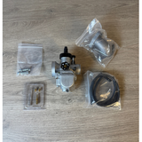 CPO PE19 carburetor—new kit, but the intake manifold rubber is missing