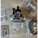 CPO PE19 carburetor—new kit, but the intake manifold rubber is missing